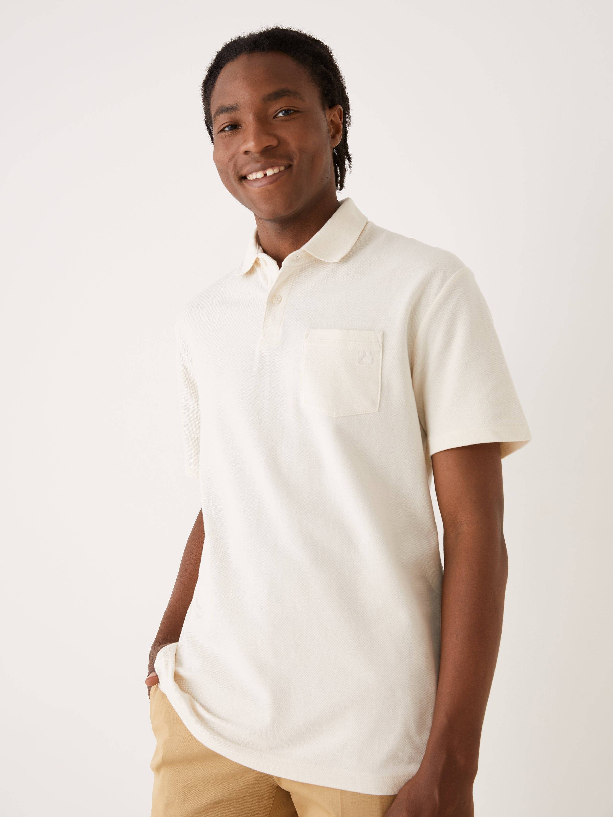 The Slim Fit Pique Polo Shirt in White sold by Frank & Oak