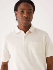 The Slim Fit Pique Polo Shirt in White sold by Frank & Oak