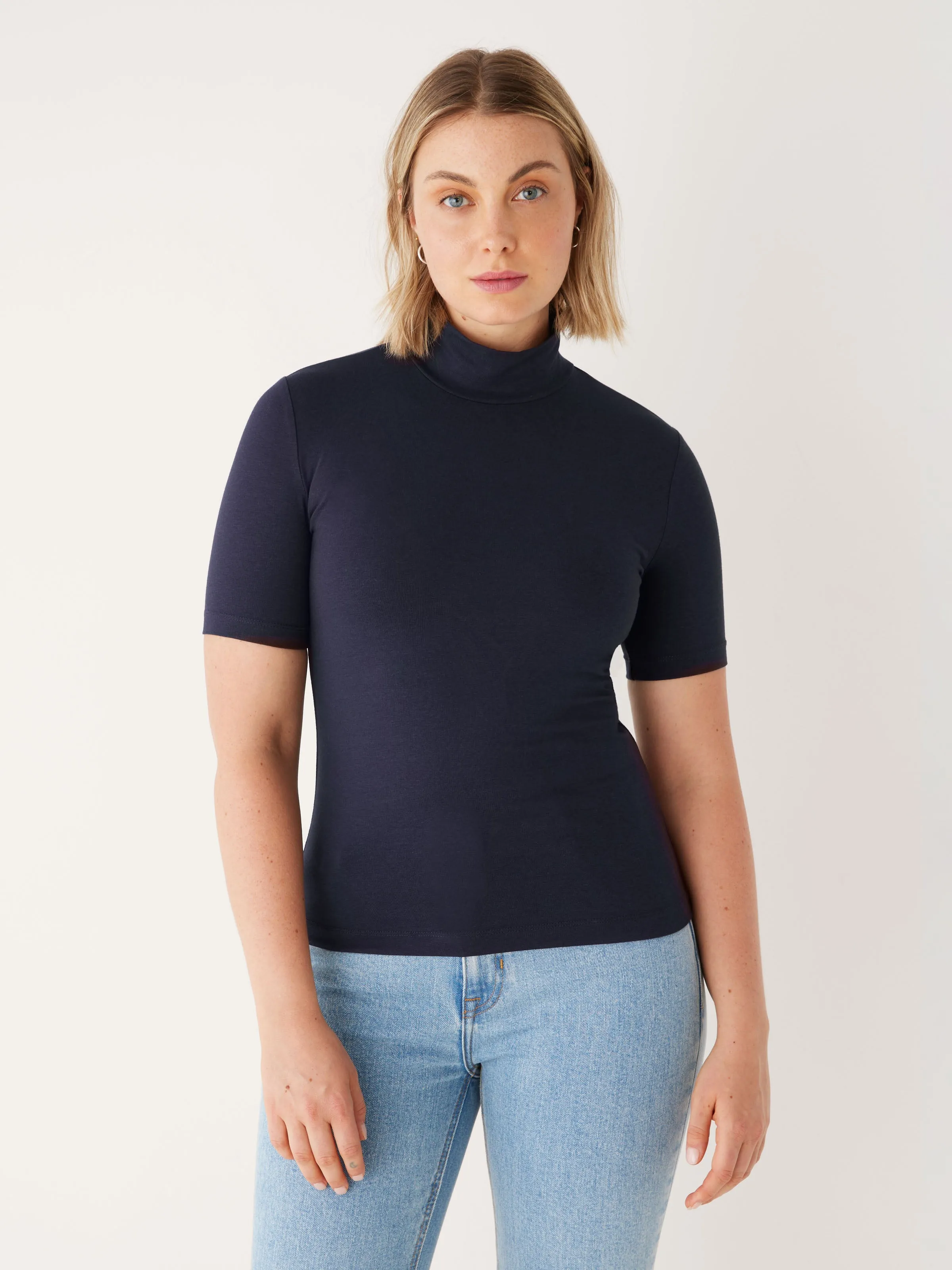 The Mid-Sleeve Mockneck in Dark Blue sold by Frank & Oak