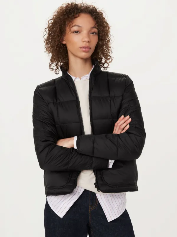 The Aero Packable Puffer Jacket in Black sold by Frank & Oak