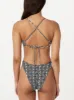 The Printed Triangle Bikini Top in Black sold by Frank & Oak