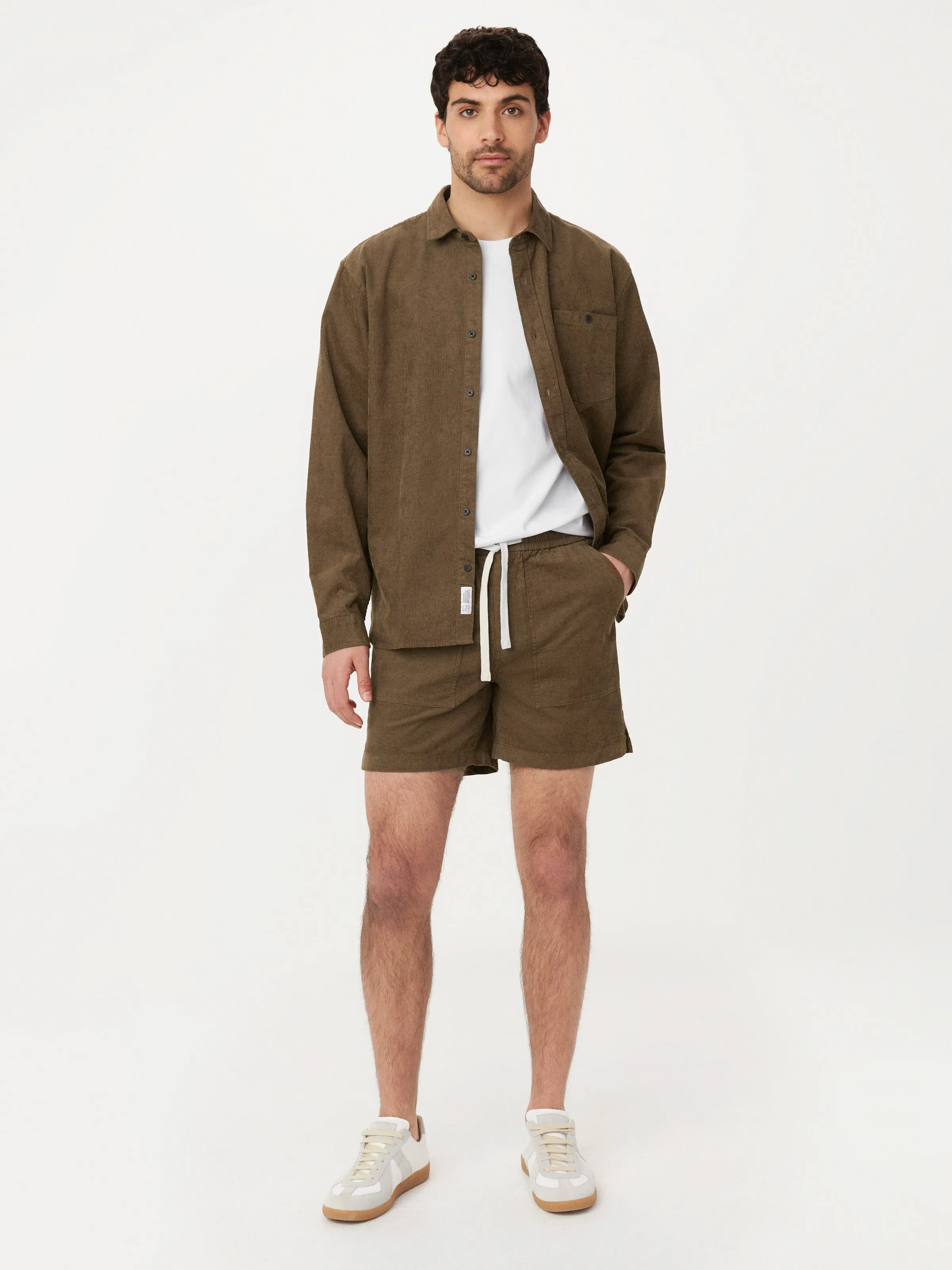 The Owen Light Corduroy Short in Tuscany Green sold by Frank & Oak