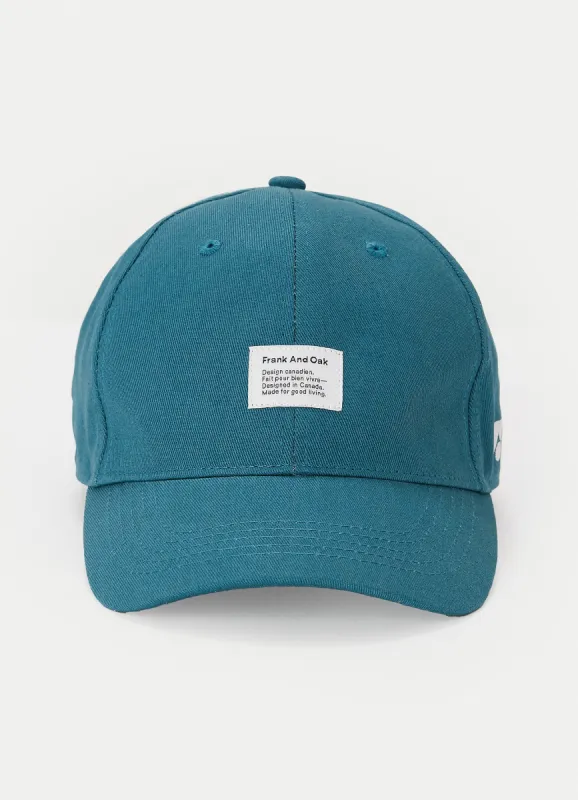 The Dad Cap in Mallard Blue sold by Frank & Oak
