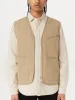 The Worker Vest in Dune sold by Frank & Oak