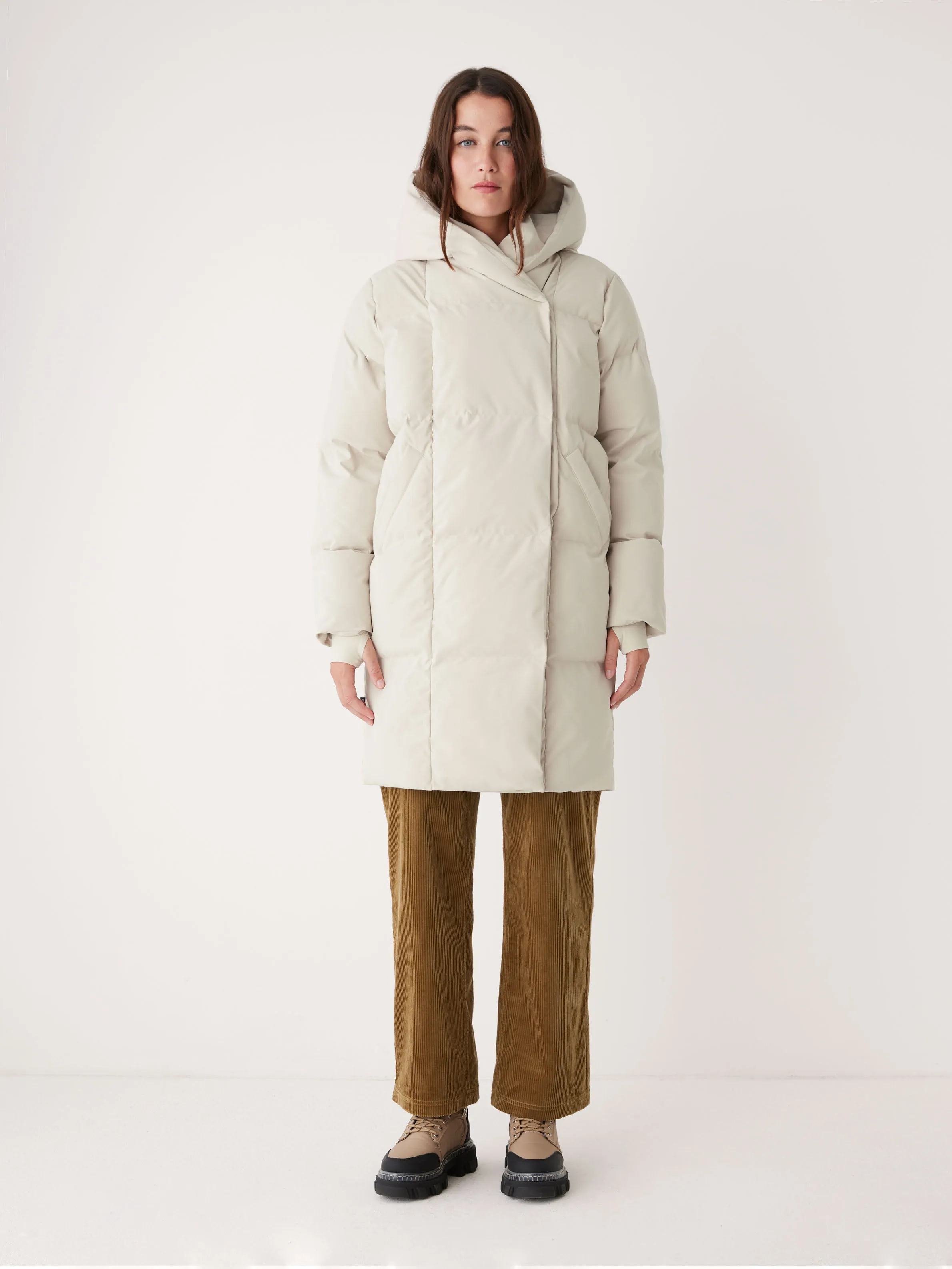 The Hygge Puffer Coat in Silver Lining sold by Frank & Oak