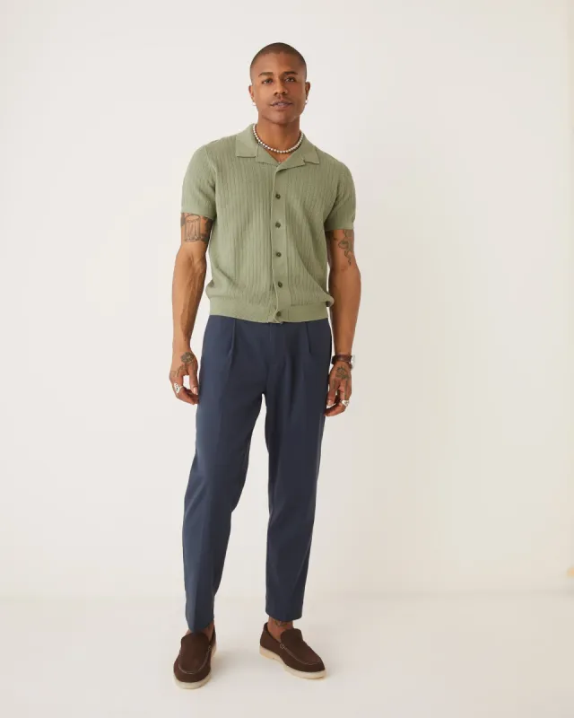 The Button-Up Polo Knit in Green sold by Frank & Oak