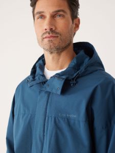 The Anorak Rain Jacket in Ocean Blue sold by Frank & Oak