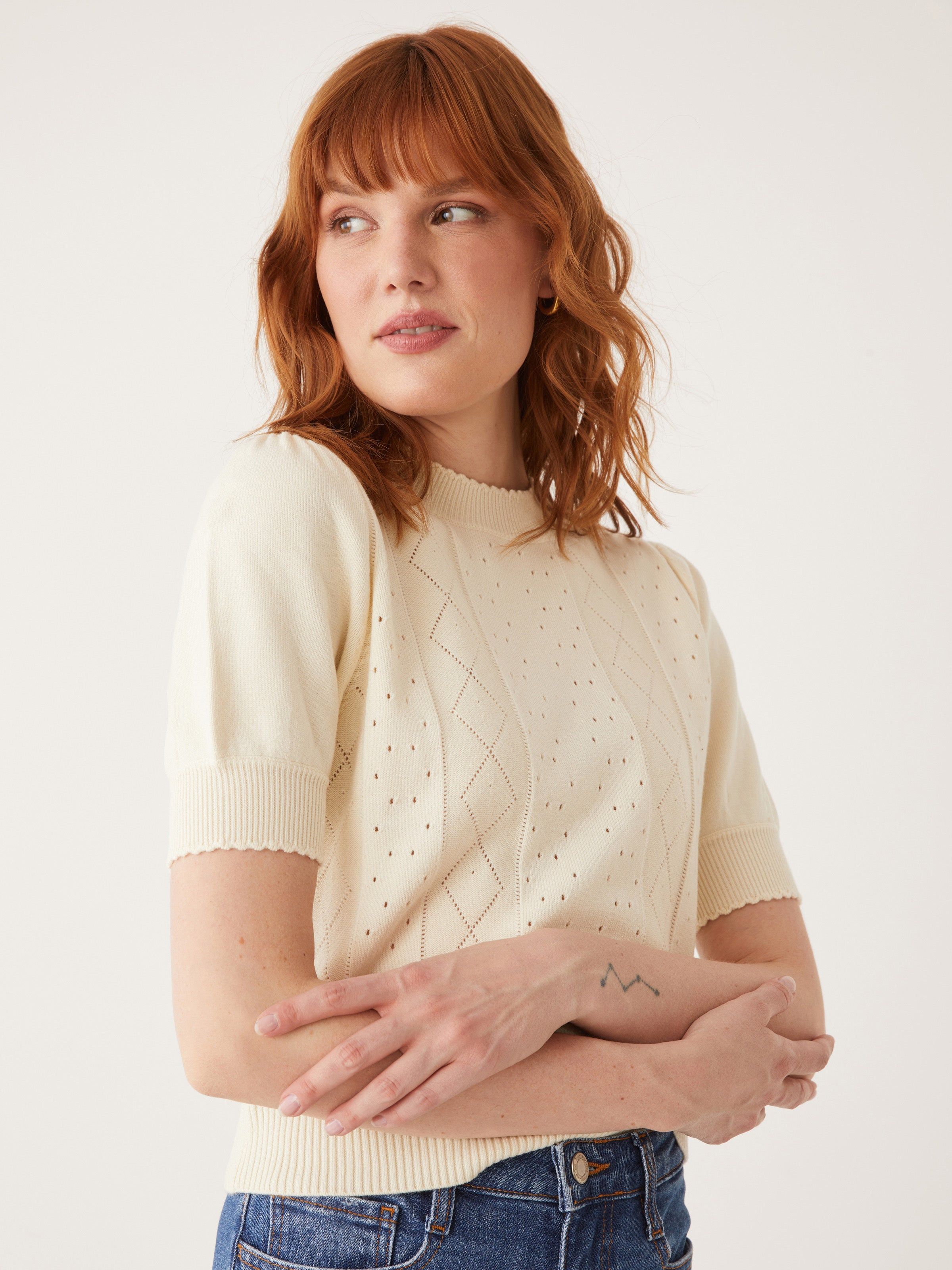 The Pointelle Sweater in White sold by Frank & Oak