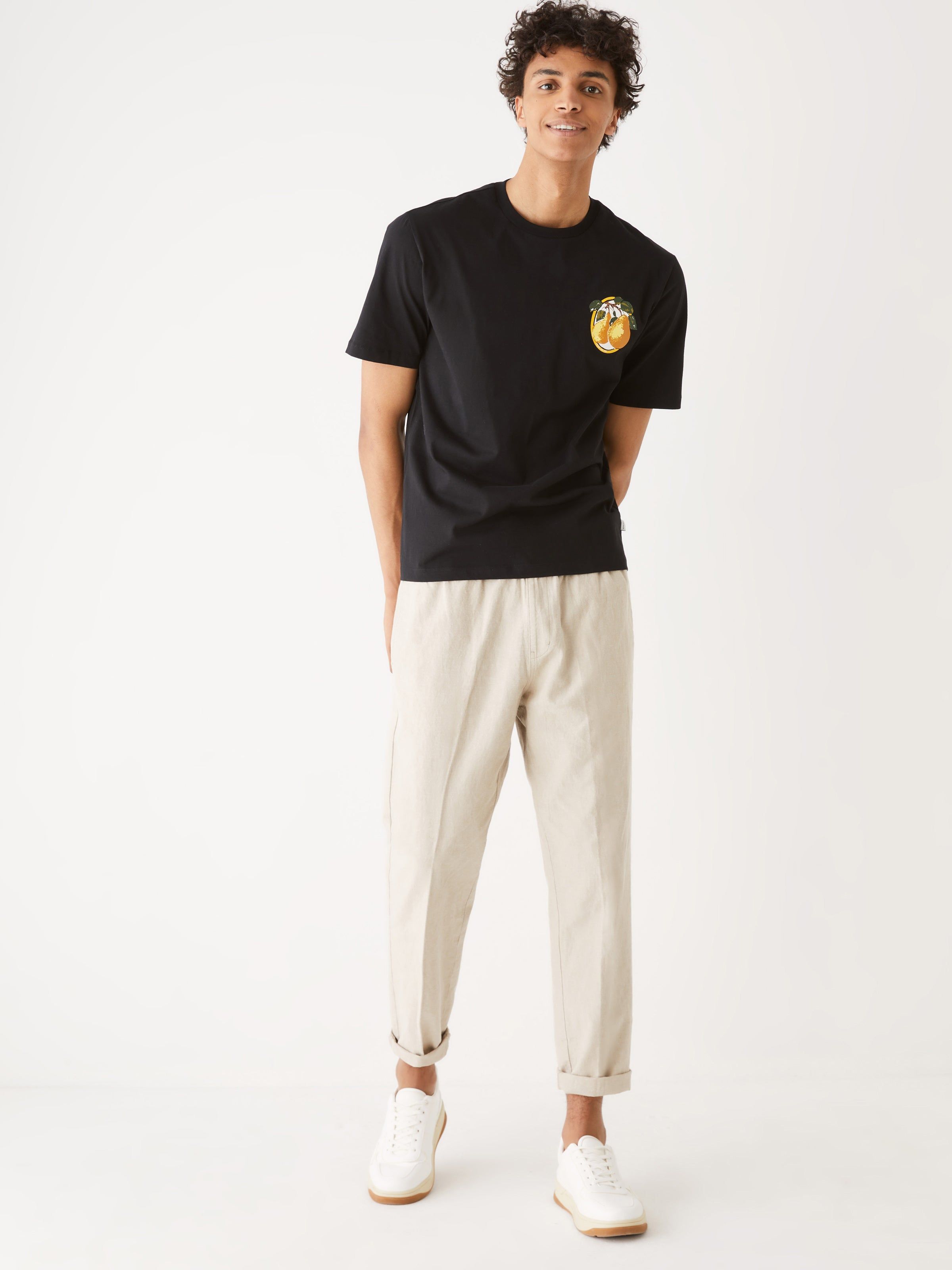 The Relaxed Fit Graphic T-Shirt in Black sold by Frank & Oak