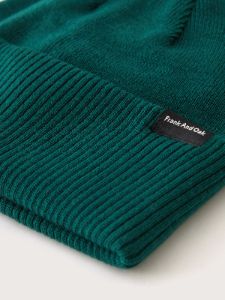 The Merino Wool Beanie in Deep Green sold by Frank & Oak