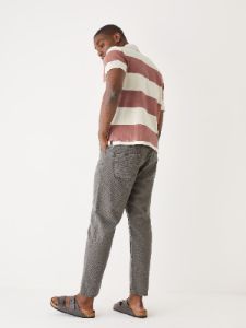 The Striped Rugby Polo Shirt in Cognac sold by Frank & Oak