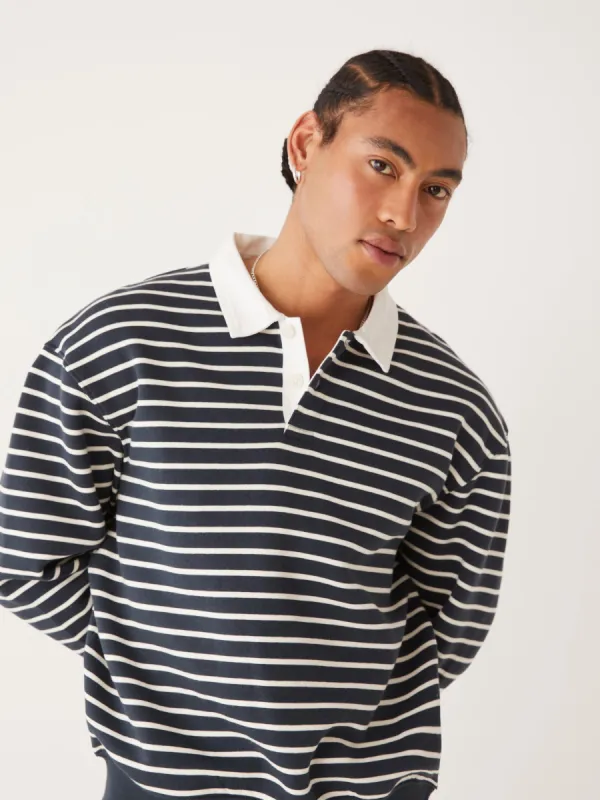 The Fleece Striped Polo Sweater in Dark Navy sold by Frank & Oak