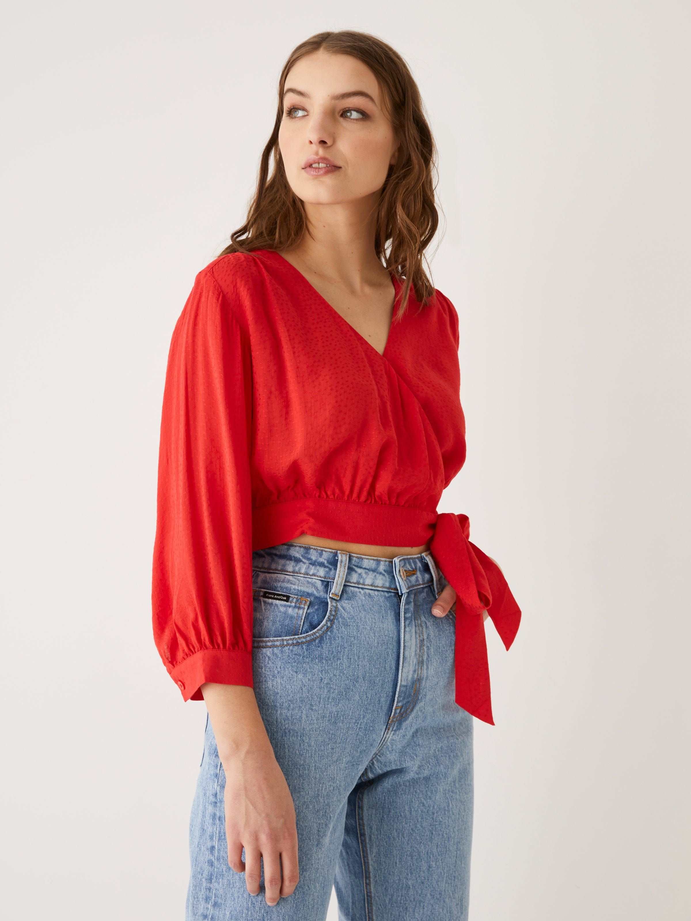 The Textured Wrap Top in Tomato Red sold by Frank & Oak