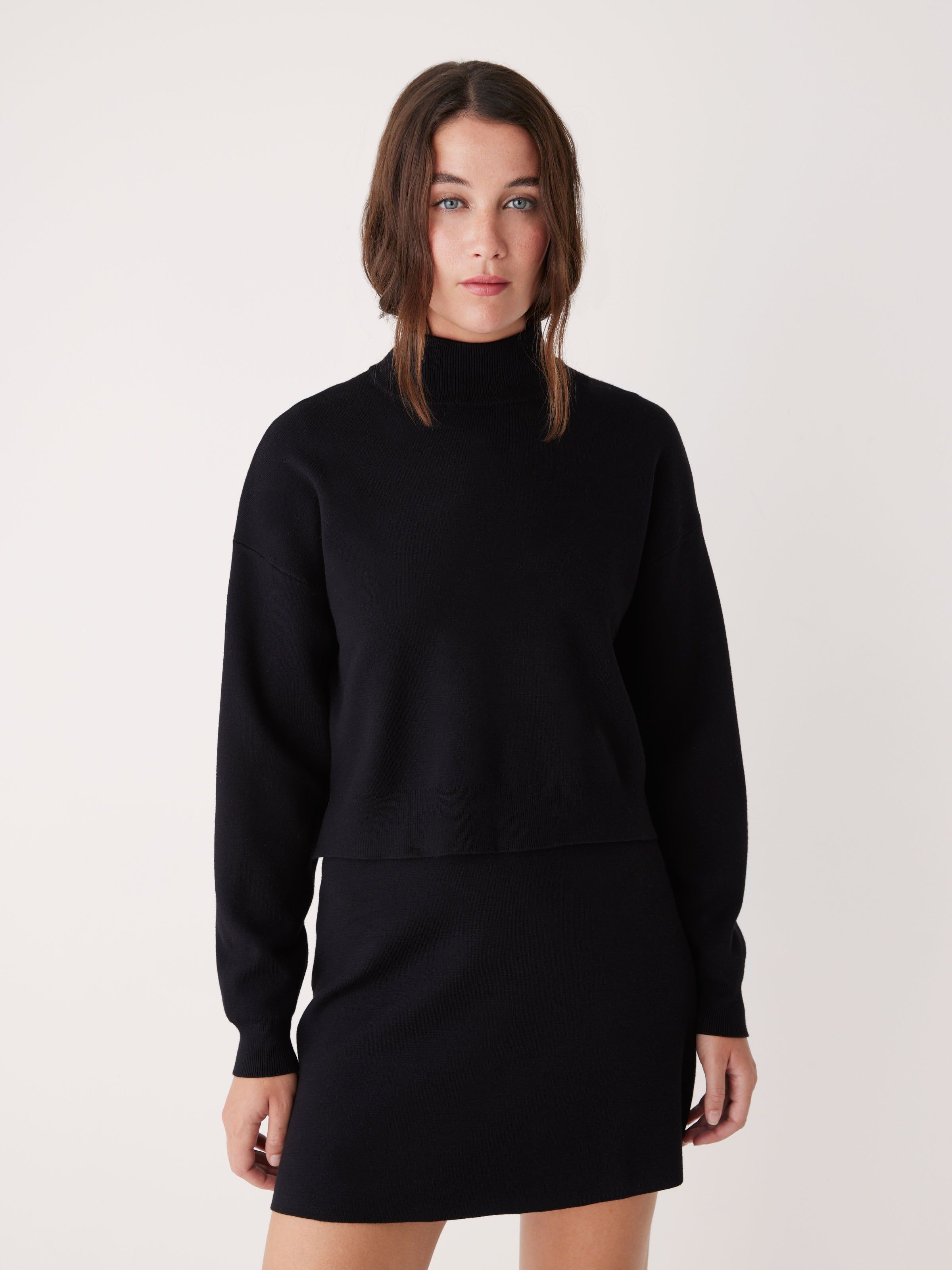 The Compact Mockneck Sweater in Black sold by Frank & Oak