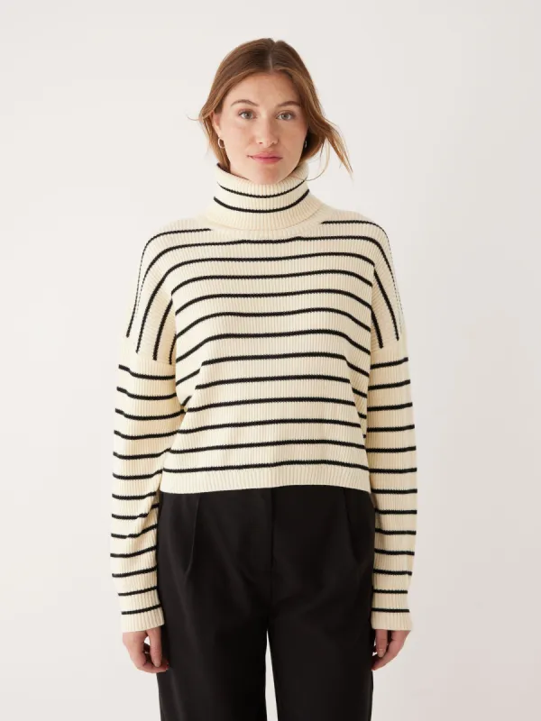 The Merino Striped Turtleneck Sweater in White sold by Frank & Oak