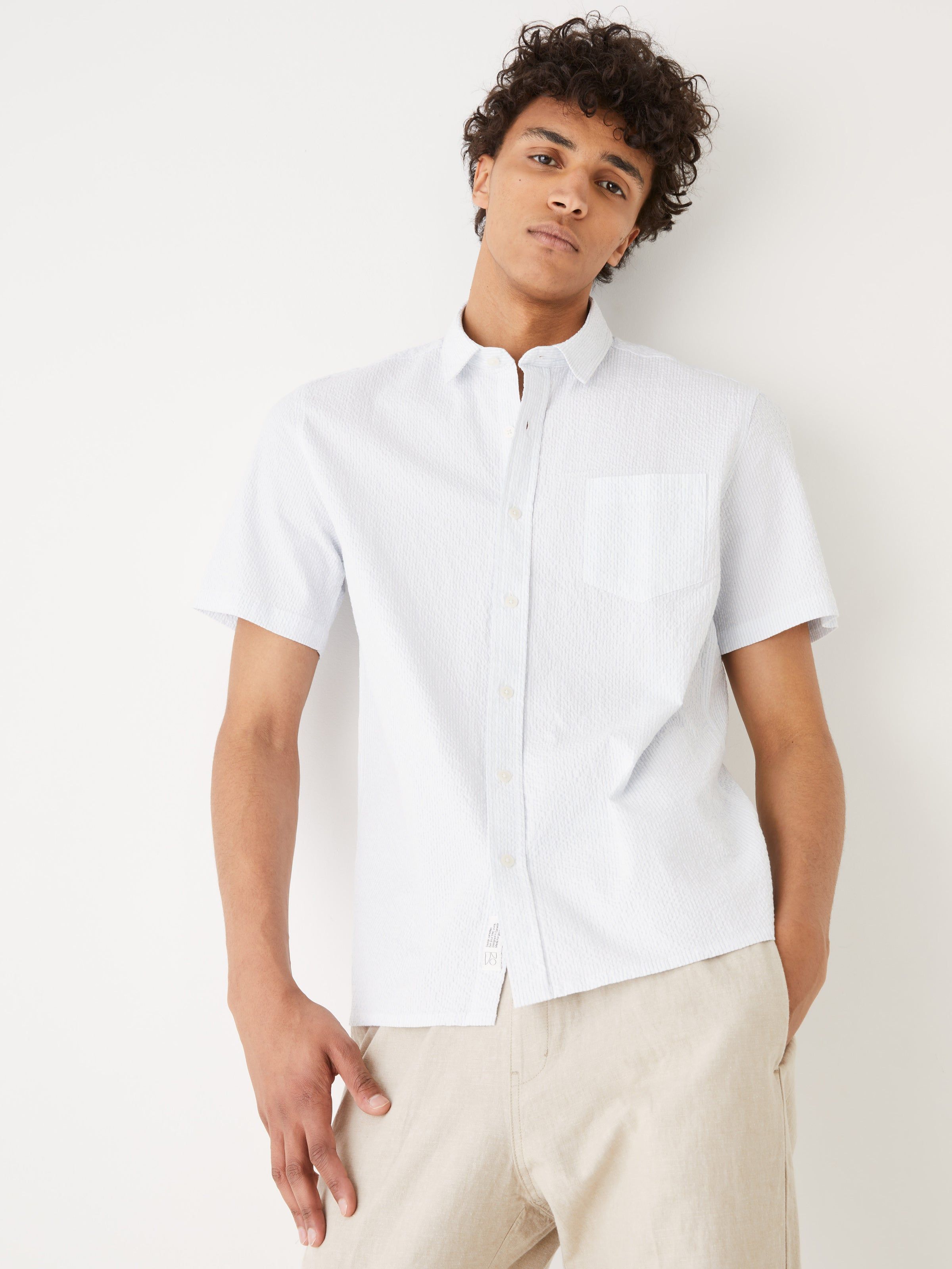 The Short-Sleeved Striped Seersucker Shirt in Blue sold by Frank & Oak