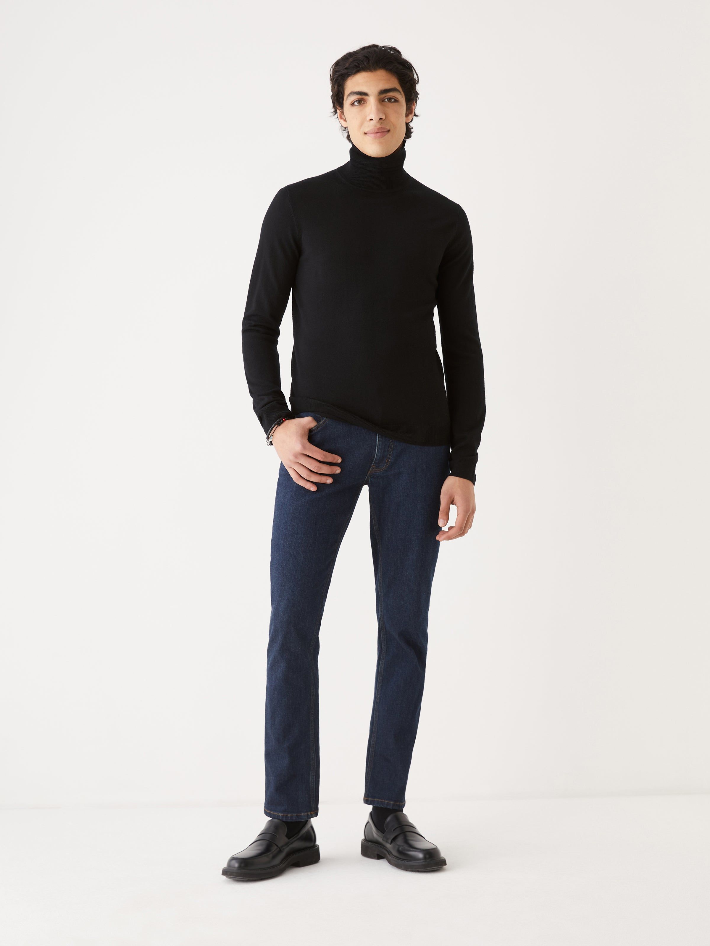 The Merino Wool Turtleneck in Black sold by Frank & Oak