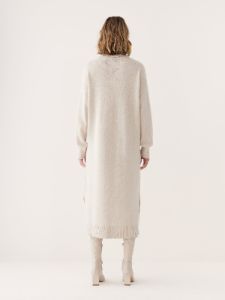 The Turtleneck Sweater Dress in Cream sold by Frank & Oak