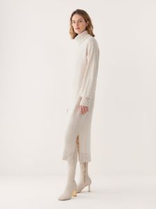 The Turtleneck Sweater Dress in Cream sold by Frank & Oak