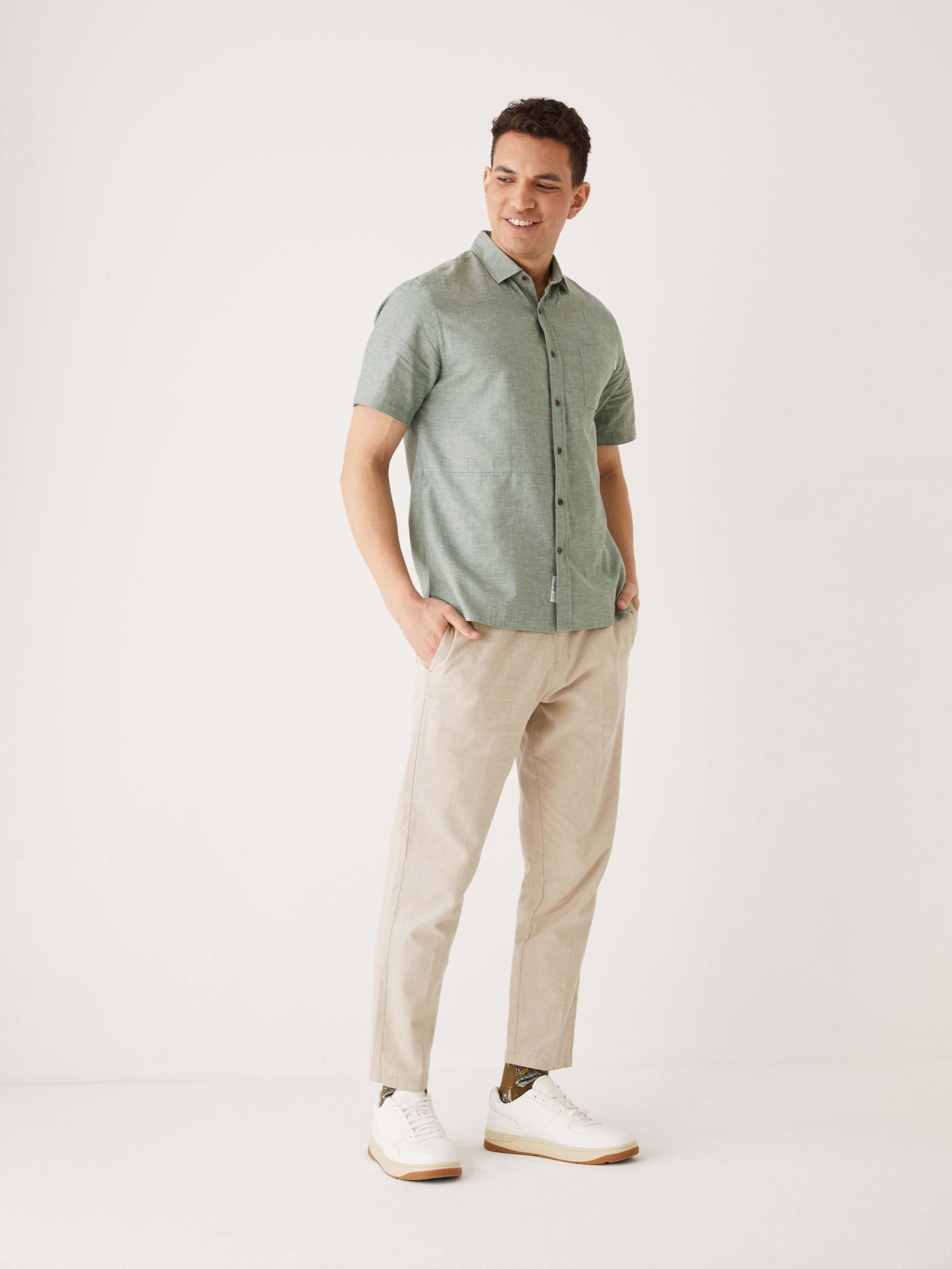 The Short Sleeve Chambray Shirt in Green sold by Frank & Oak