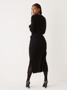 The Merino Wool Sweater Dress in Black sold by Frank & Oak