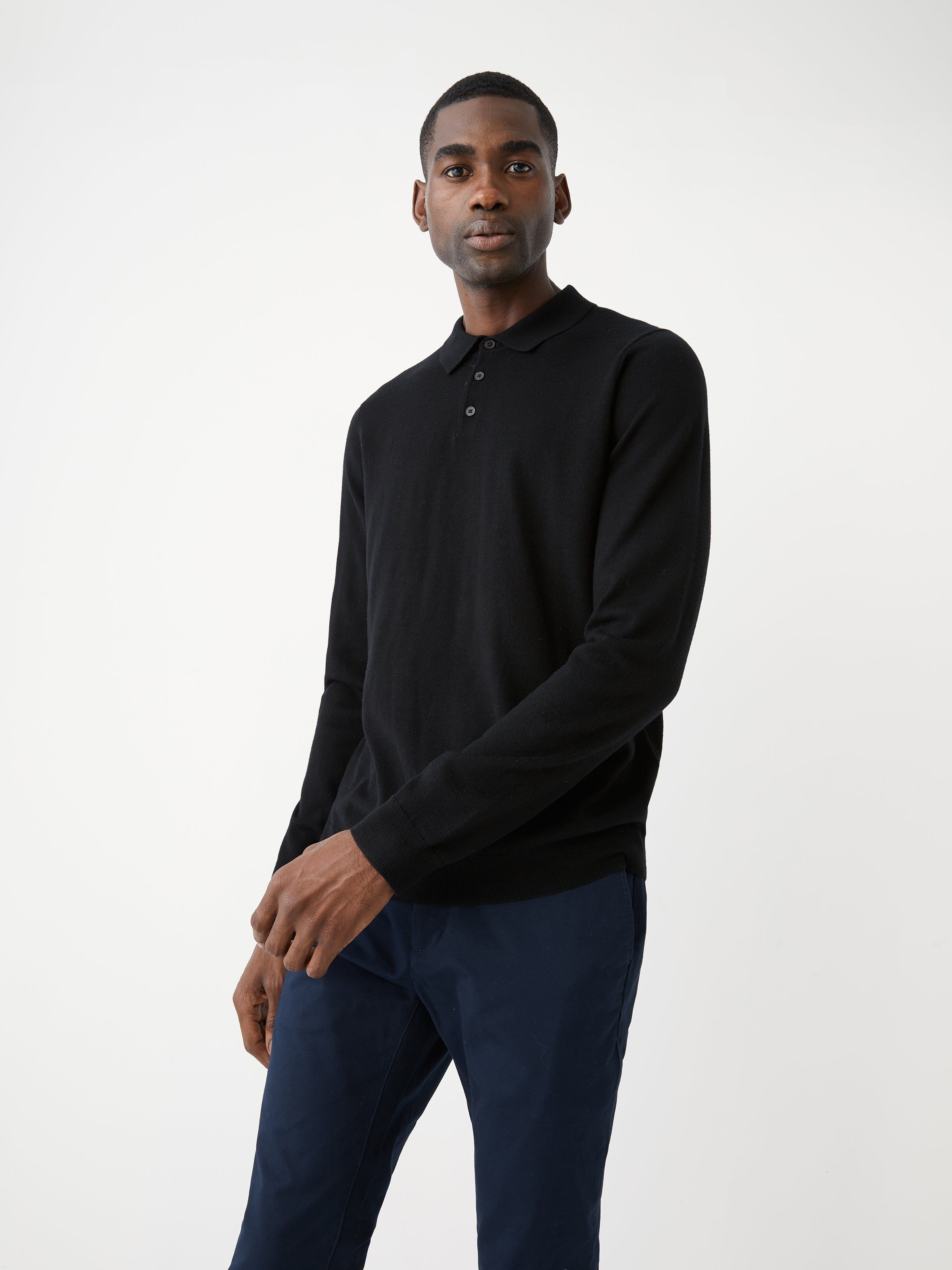 The Merino Wool Polo Sweater in Black sold by Frank & Oak