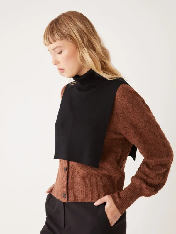 The Merino Wool Neck Warmer in Black sold by Frank & Oak