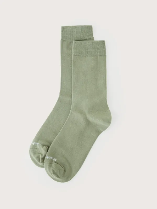 The Calf-Length Socks in Oil Green sold by Frank & Oak