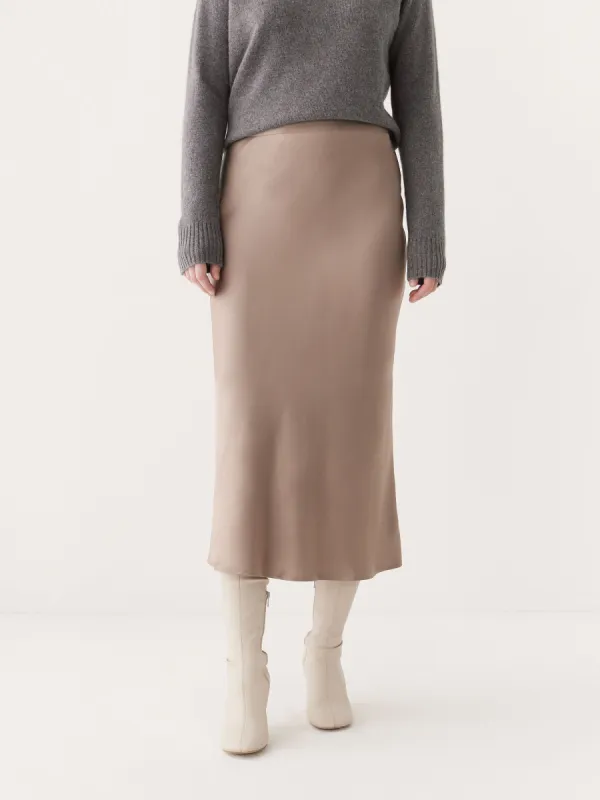 The Satin Midi Skirt in Champagne sold by Frank & Oak