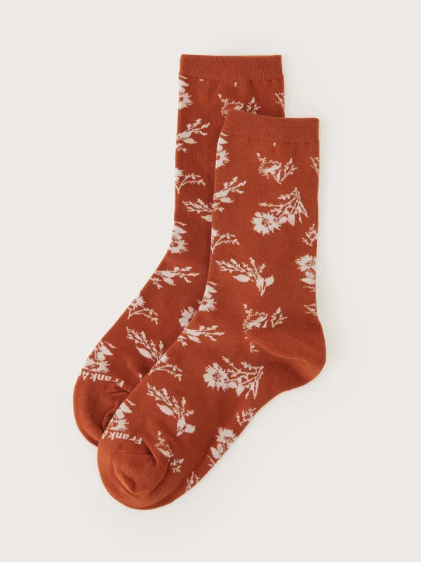 The Organic Cotton Floral Socks in Autumn Orange sold by Frank & Oak