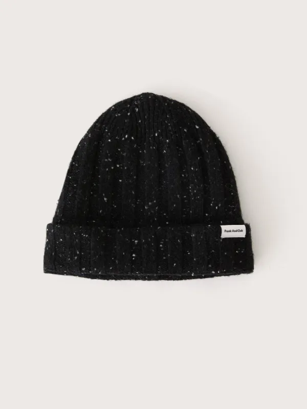 The Lambswool Beanie in Black sold by Frank & Oak