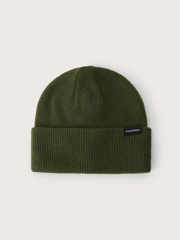 The Merino Wool Beanie in Dark Olive sold by Frank & Oak
