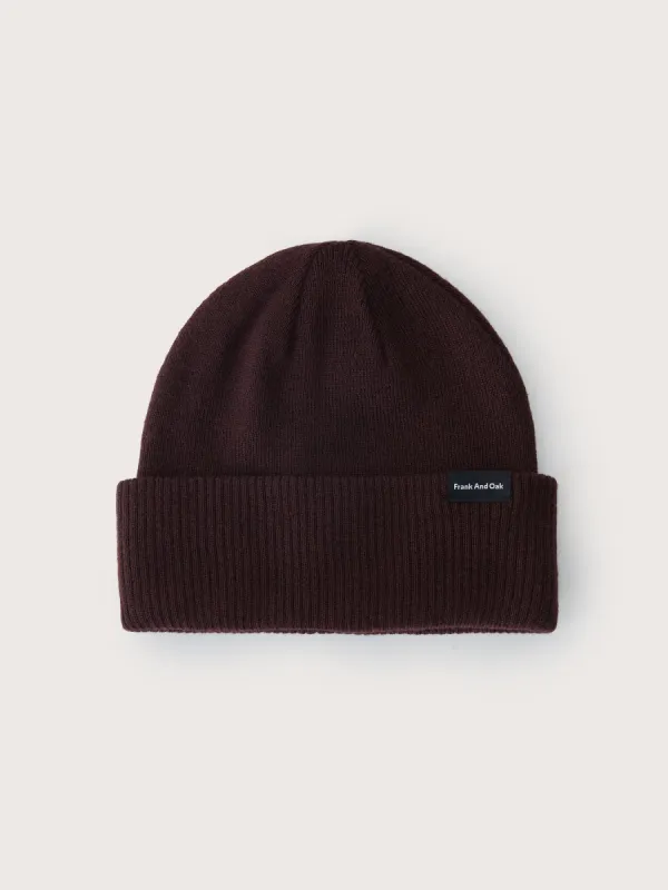 The Merino Wool Beanie in Dark Red sold by Frank & Oak