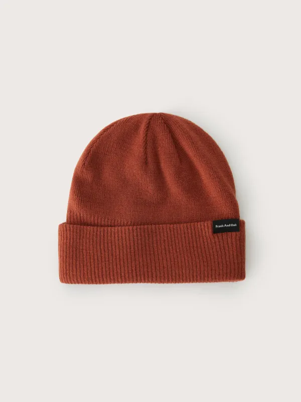 The Merino Wool Beanie in Clay Red sold by Frank & Oak