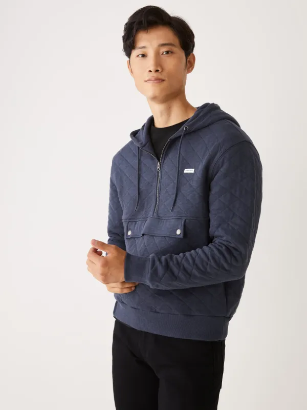 The Quilted Half-Zip Pull-Over in Night Blue sold by Frank & Oak
