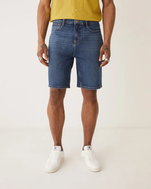 The Nolan Straight Fit 10in Short in Dark navy sold by Frank & Oak