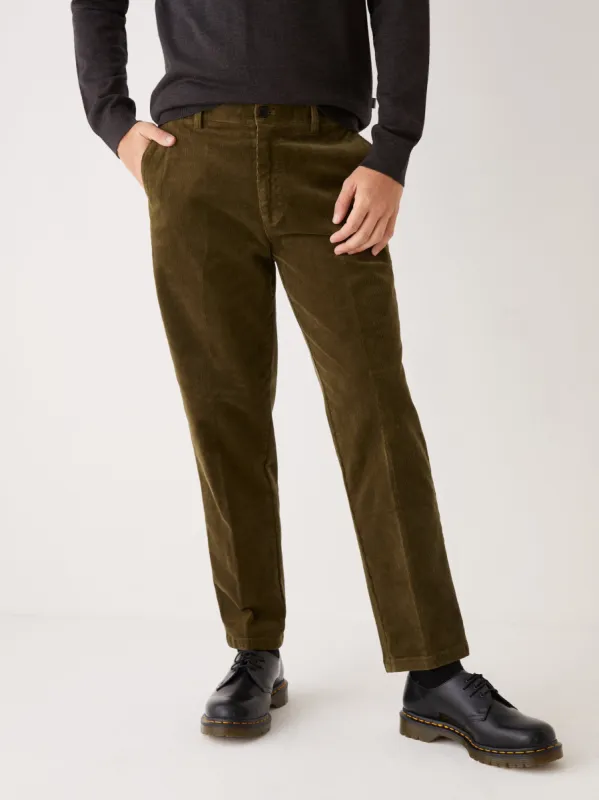 The Cropped Tapered Fit Corduroy Pant in Dark Olive sold by Frank & Oak