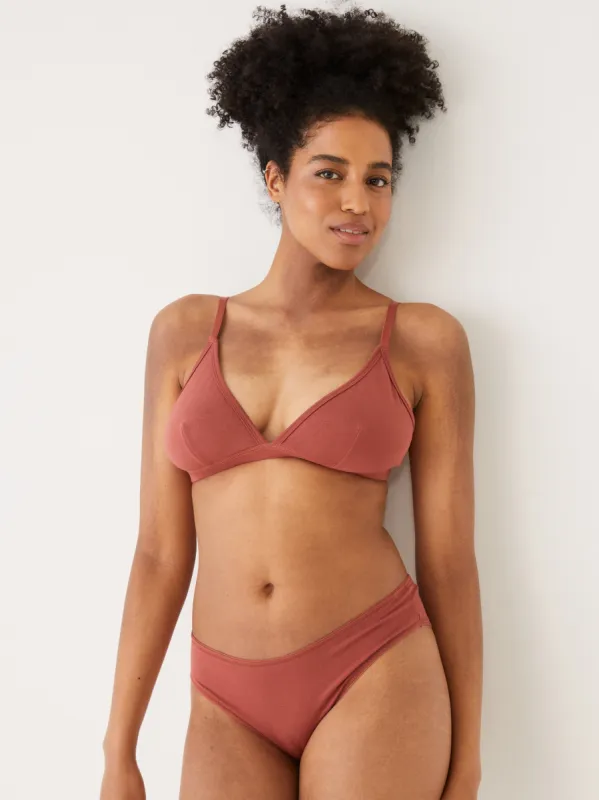 The Fluid Pull-On Triangle Bralette in Earthy orange sold by Frank & Oak