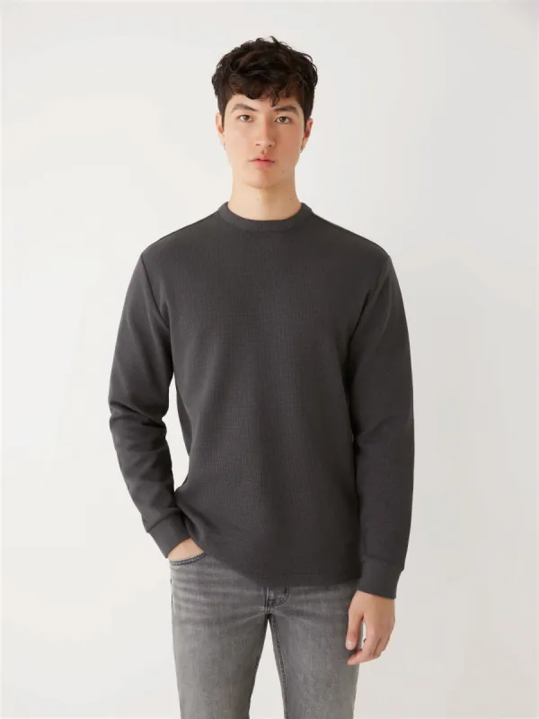 The Long Sleeve Waffle Crewneck in Dark Grey sold by Frank & Oak