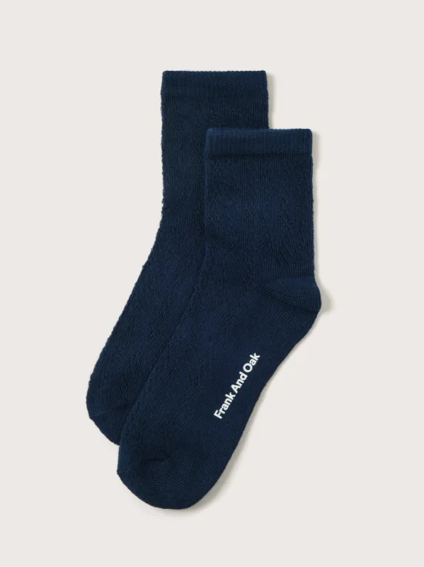 The Quarter Length Pointelle Socks in Navy sold by Frank & Oak