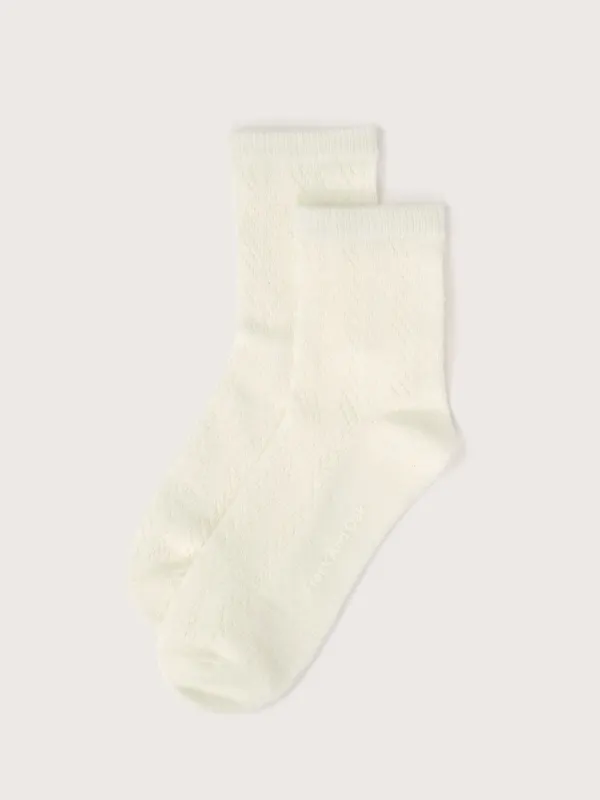 The Quarter Length Pointelle Socks in White sold by Frank & Oak