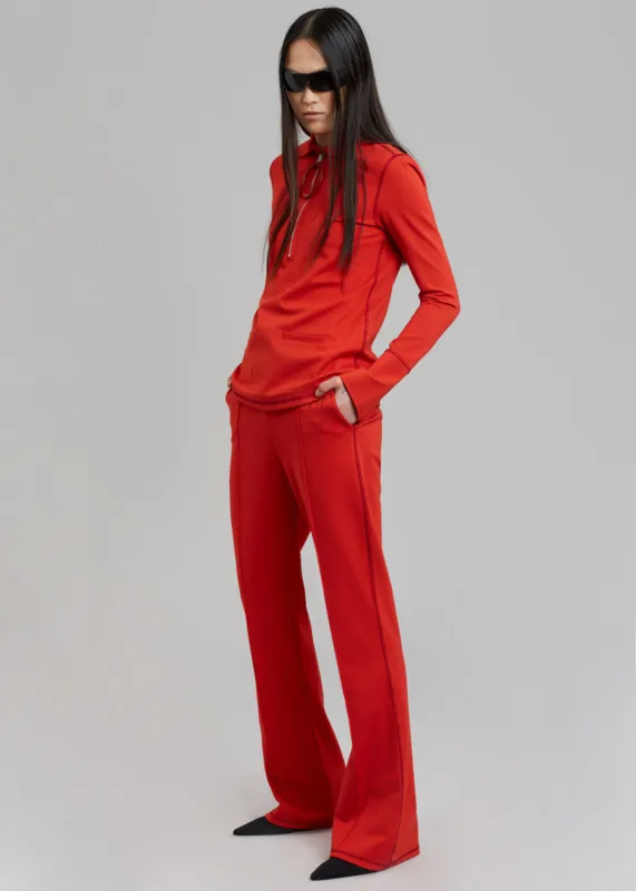 JW Anderson Slim Flare Track Pants - Red sold by Frankie Shop