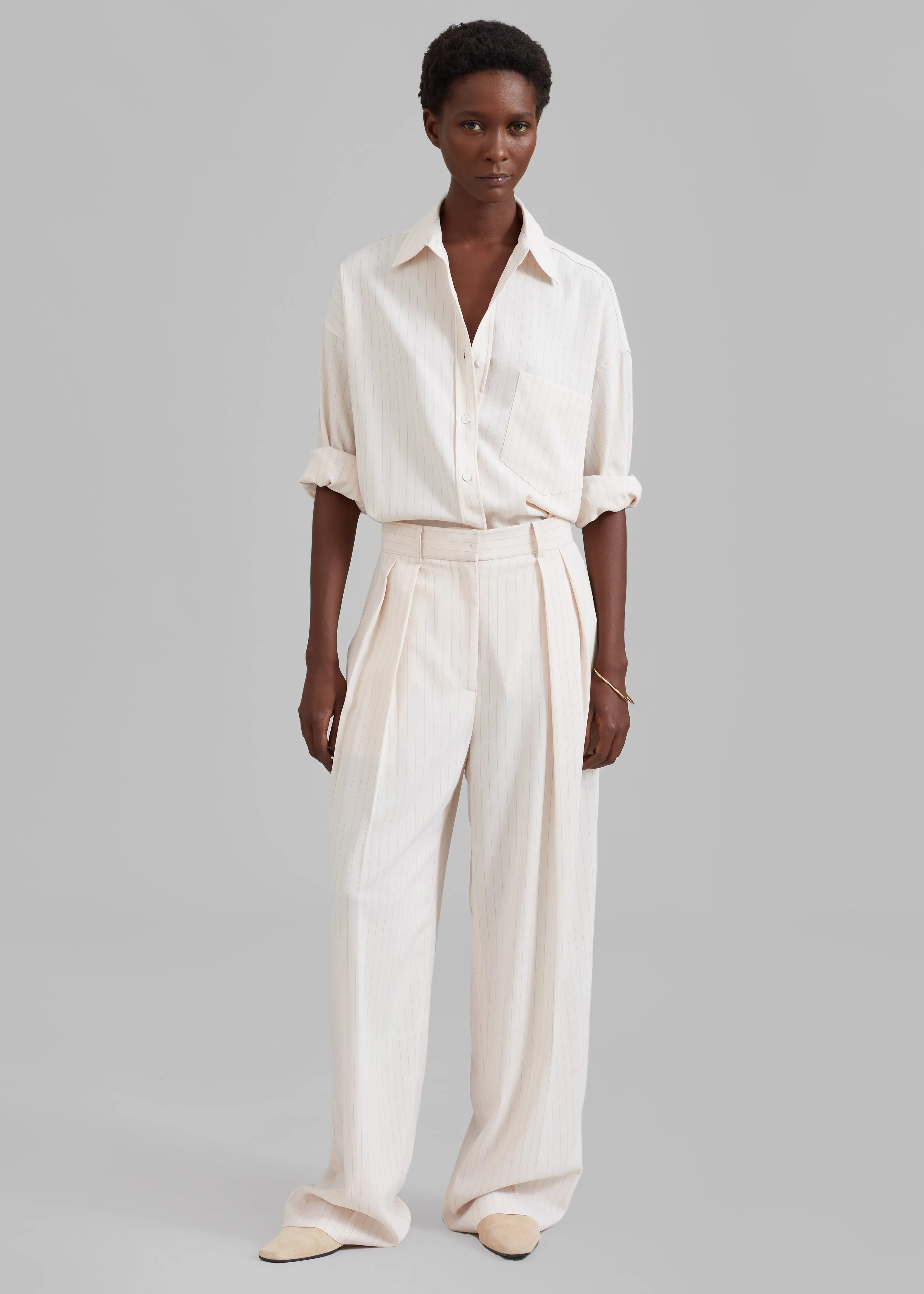 Tansy Fluid Pleated Trousers - Beige Pinstripe sold by Frankie Shop