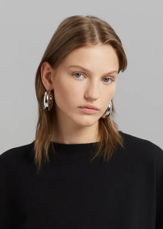JW Anderson Bumper-Tube Earrings - Silver Tone sold by Frankie Shop