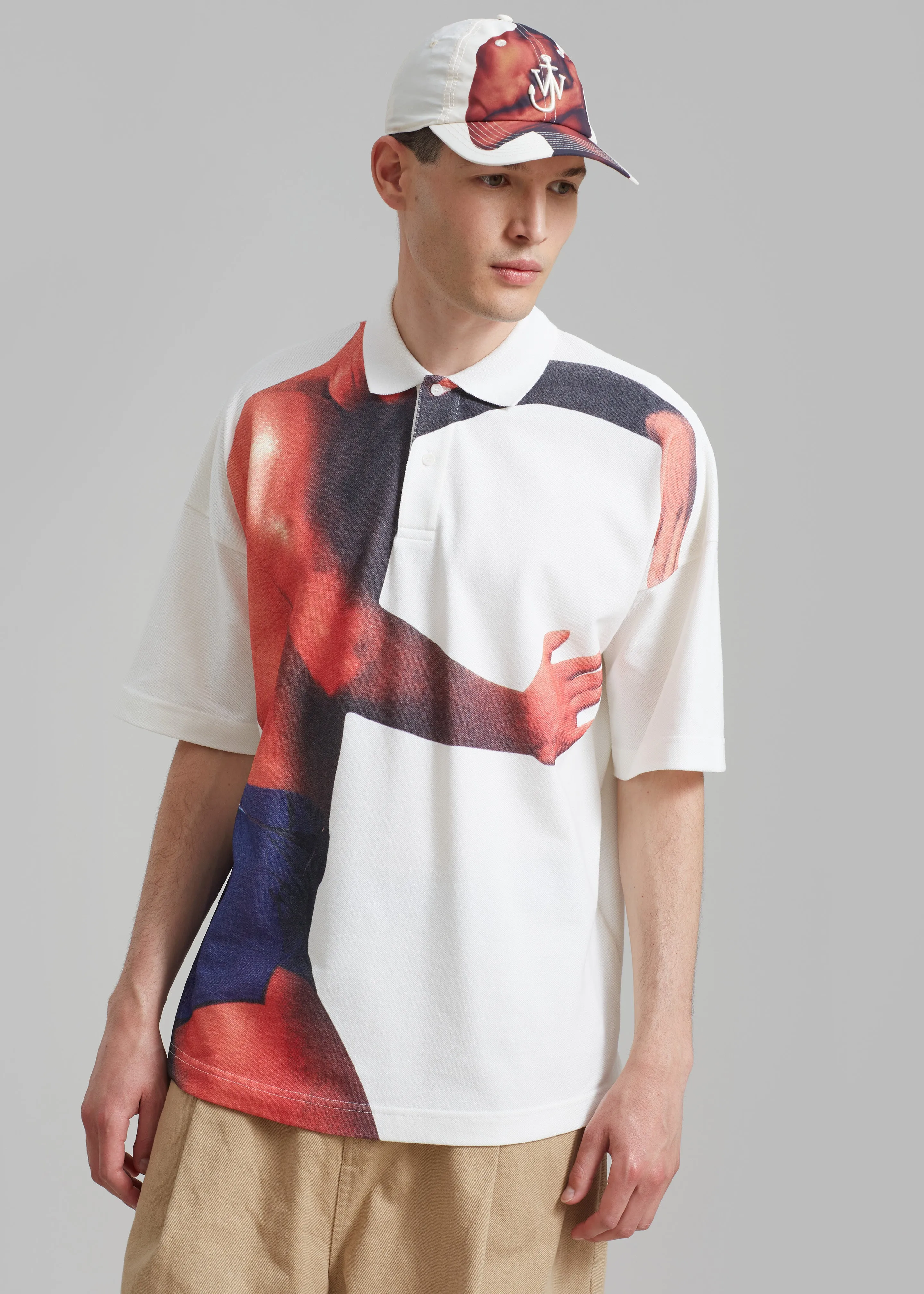 JW Anderson Profile Stud Printed Polo Shirt - Off White sold by Frankie Shop