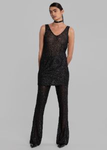 REMAIN Sequin Knit Fitted Flared Pants - Black sold by Frankie Shop