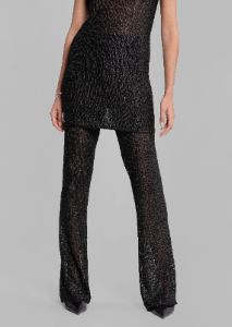 REMAIN Sequin Knit Fitted Flared Pants - Black sold by Frankie Shop