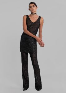 REMAIN Sequin Knit Fitted Flared Pants - Black sold by Frankie Shop