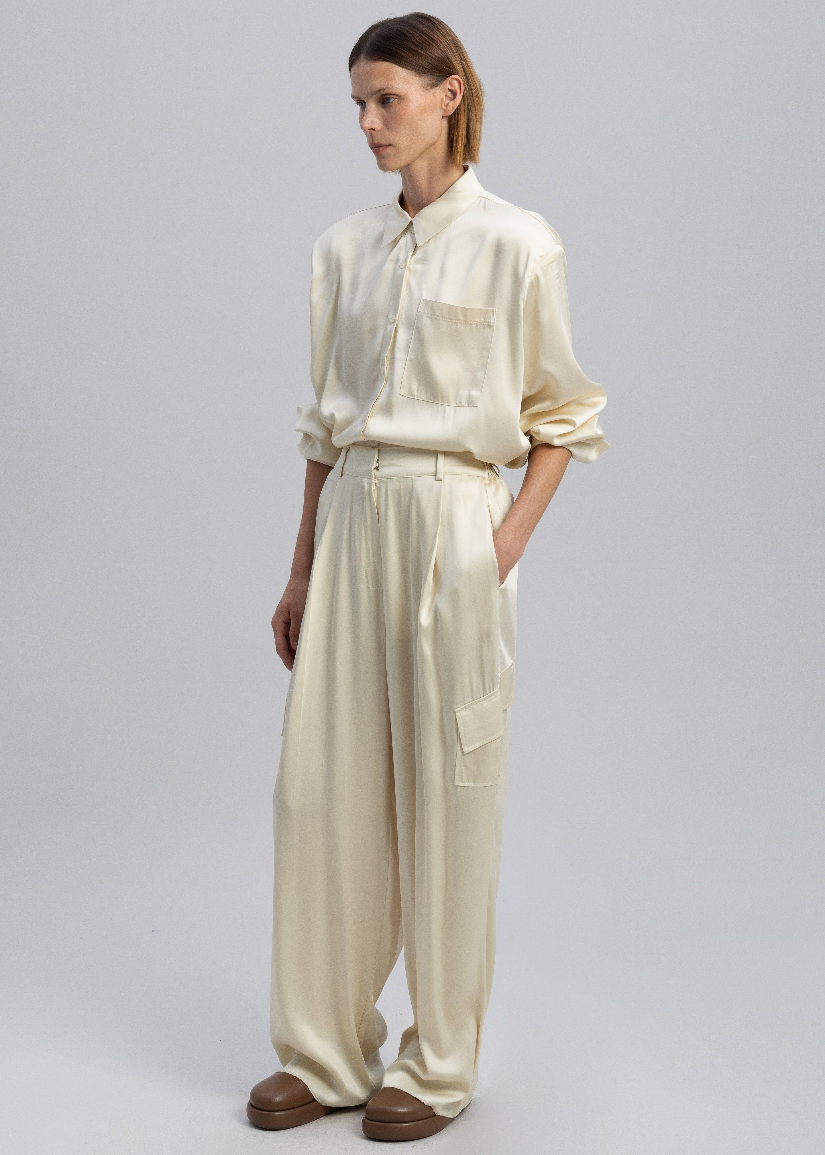 Menne Silky Trousers - Ivory sold by Frankie Shop