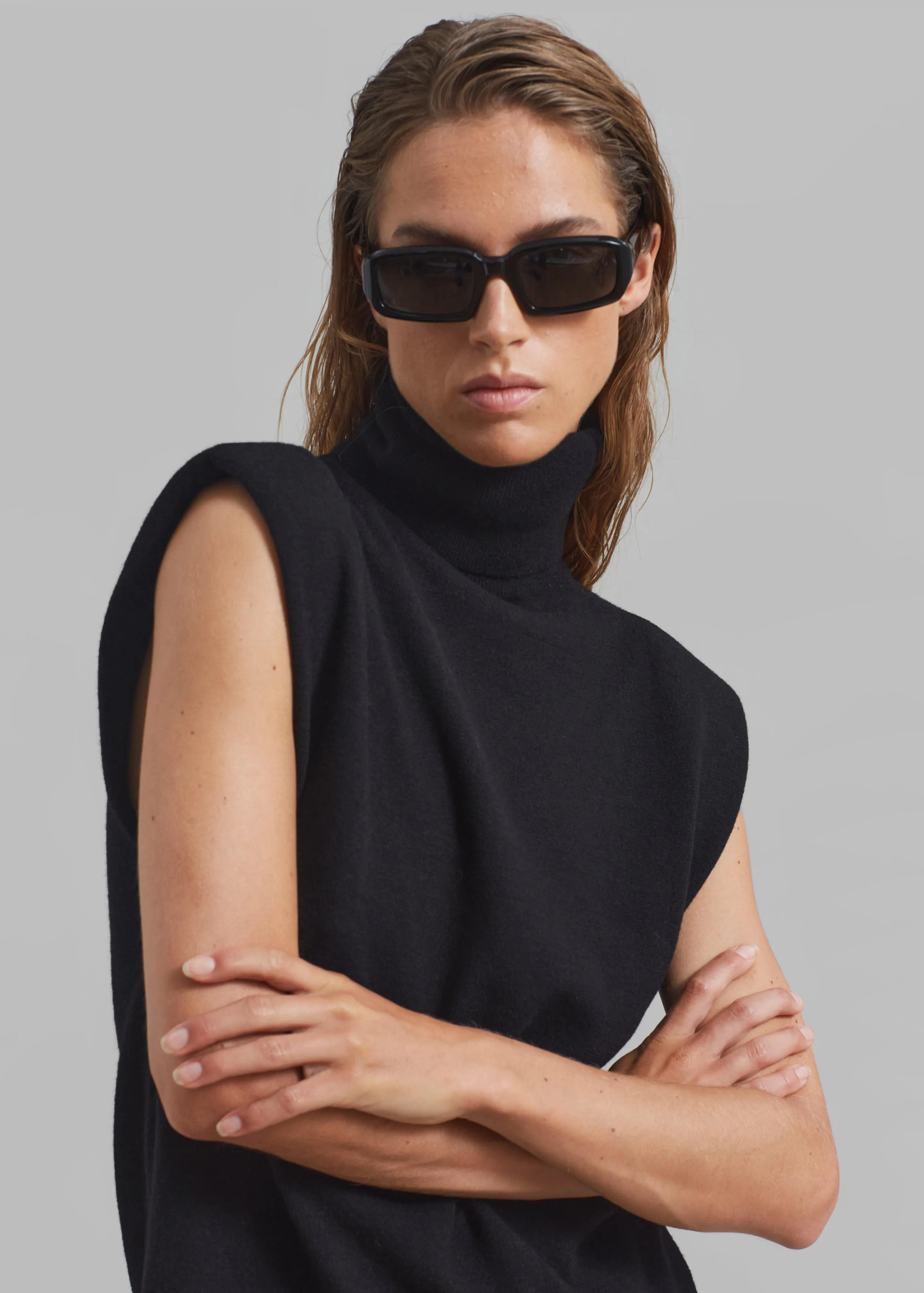 Nadia Thin Padded Sleeveless Turtleneck - Black sold by Frankie Shop